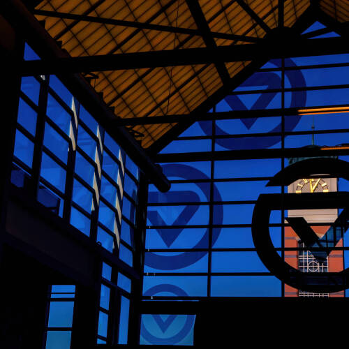 FEATURE_ Cook Carillon Tower seen through glass of Kirkhof Center entryway on Monday,  2025-11-17.  Photography by Steve Jessmore